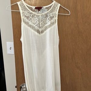 Ivory sleeveless shirt